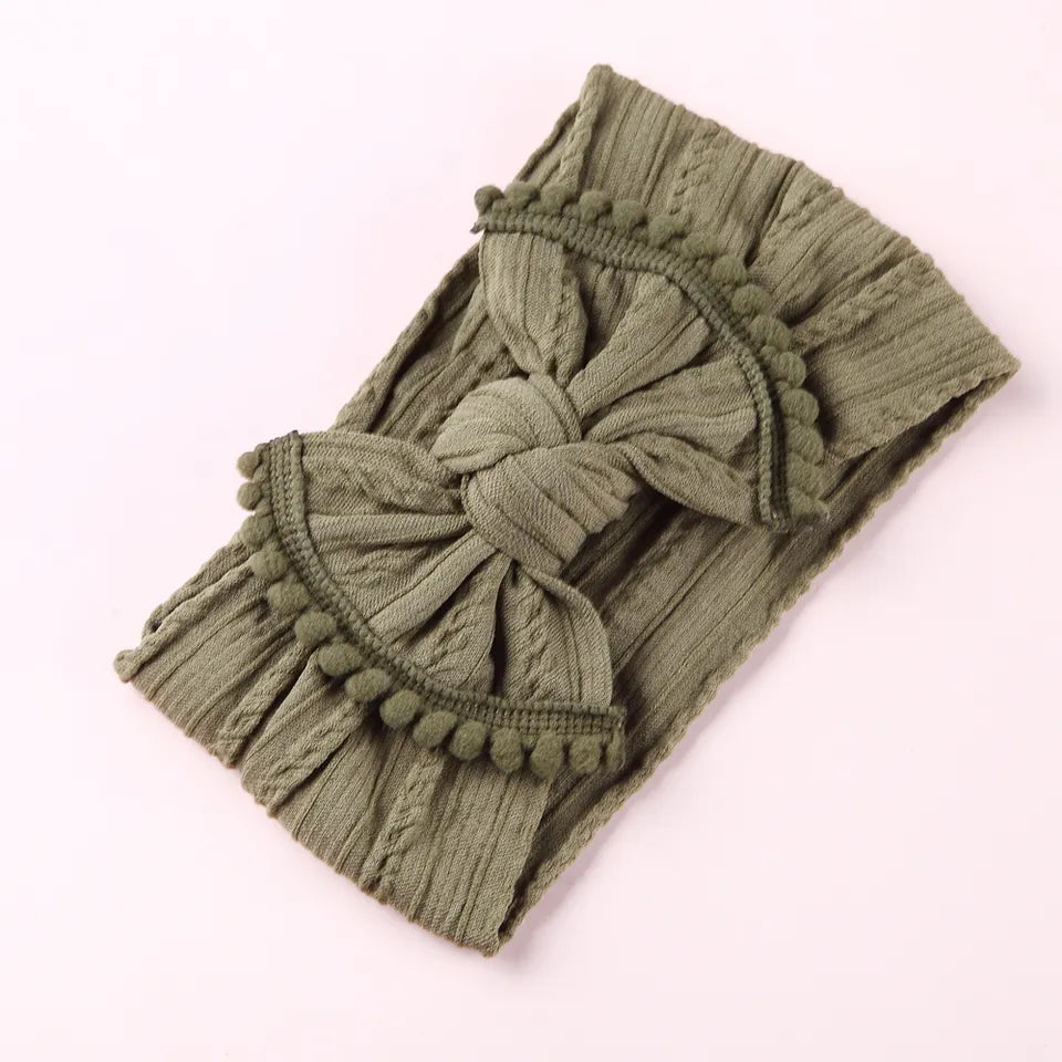 Cable knit pompom bow headband