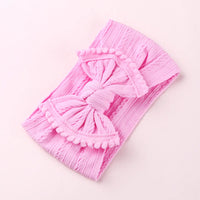 Cable knit pompom bow headband