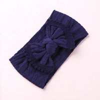 Cable knit pompom bow headband