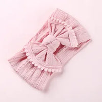 Cable knit pompom bow headband