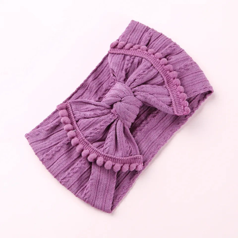 Cable knit pompom bow headband