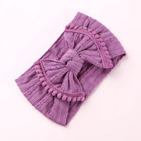Cable knit pompom bow headband